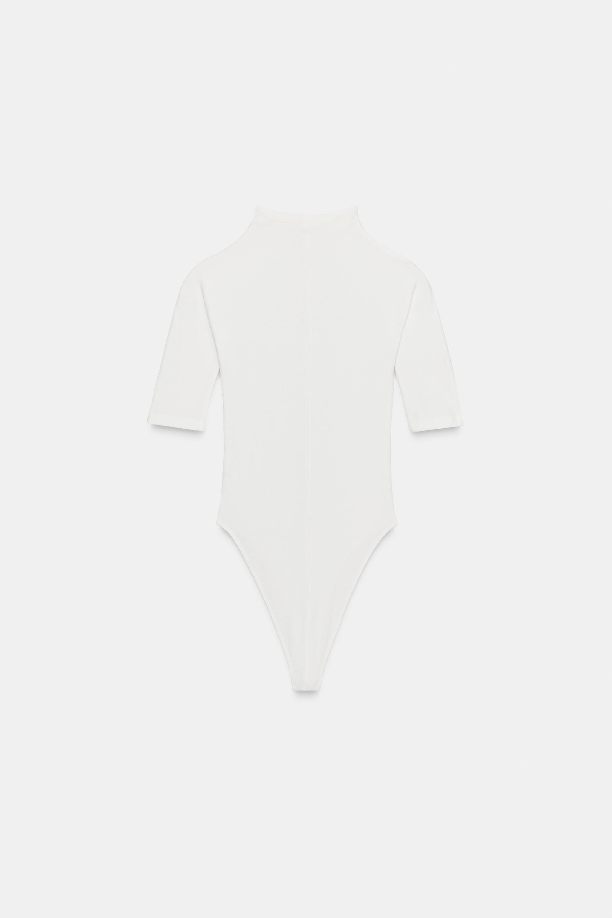 BODY RUSTIQUE À COL MONTANT